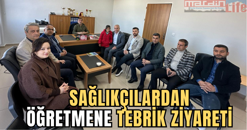 Sağlıkçılardan öğretmene tebrik ziyareti