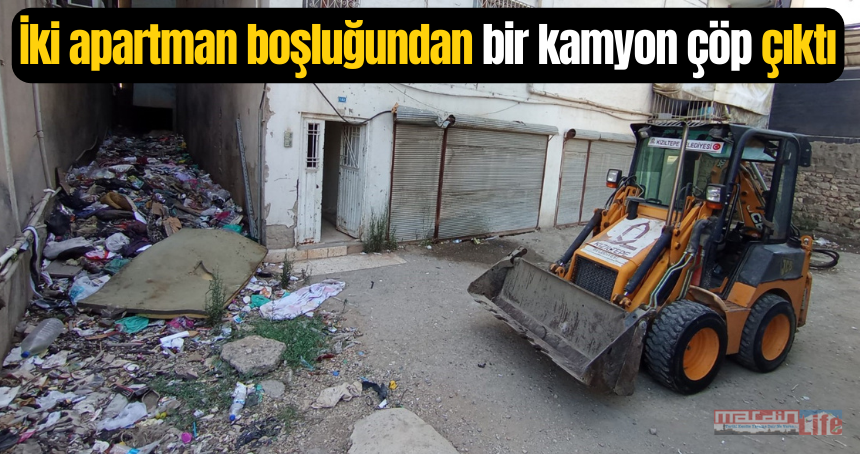 İki apartman boşluğundan bir kamyon çöp çıktı